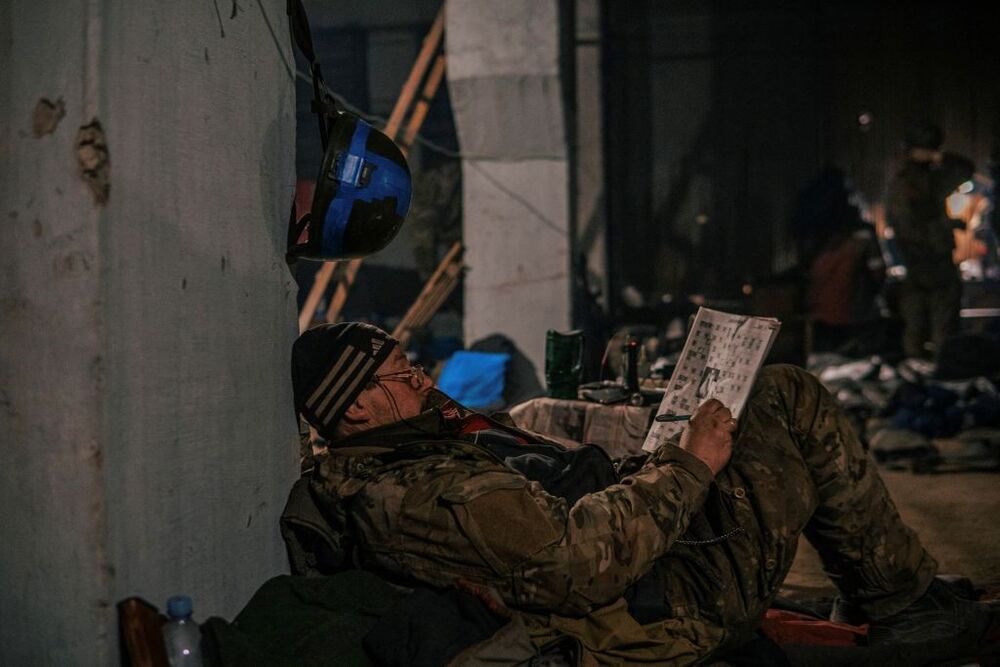 Ukrainian Azovstal service members are seen within the Azovstal Iron and Steel Works complex in Mariupol  / DMYTRO OREST KOZATSKYI/AZOV REGIMENT PRESS SERVICE